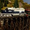 General Moters EMD GP20 Demonstrator strutting its stuff for an excursion car full of Sweetwater & Thunder Mt. Execs and their families.